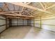 Interior of a barn with wood framing offering a spacious area that can be adapted for a variety of uses at 4330 S 100 E, Lebanon, IN 46052