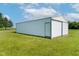 Exterior of a modern outbuilding featuring white siding, designed to enhance the usability and storage of the property at 4330 S 100 E, Lebanon, IN 46052