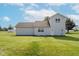 Side angle of a 2-story home on an expansive lawn showcasing its backyard, ideal for outdoor activities and relaxation at 4330 S 100 E, Lebanon, IN 46052