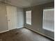 Bedroom with carpet, neutral walls, and bright natural light from two windows at 4466 Buffalo Ln, Martinsville, IN 46151