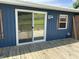 Back of house shows wooden porch with sliding glass door entrance at 4466 Buffalo Ln, Martinsville, IN 46151