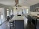 Modern kitchen with a large island, stainless steel appliances, and ample counter space at 4466 Buffalo Ln, Martinsville, IN 46151
