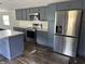 Stylish kitchen featuring stainless steel appliances, sleek countertops, and ample storage at 4466 Buffalo Ln, Martinsville, IN 46151