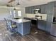 Well-appointed kitchen featuring an island with seating and pendant lighting at 4466 Buffalo Ln, Martinsville, IN 46151