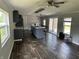 Open concept kitchen featuring a large island, sleek cabinetry, and natural light at 4466 Buffalo Ln, Martinsville, IN 46151