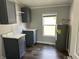 Laundry room including cabinets, countertop space, and a window for natural light at 4466 Buffalo Ln, Martinsville, IN 46151