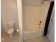Bathroom featuring a tub with jets, shower, and toilet, perfect for relaxation and convenience at 4912 Atlanta St, Anderson, IN 46013