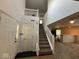 Welcoming two-story foyer with staircase at 4912 Atlanta St, Anderson, IN 46013