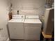 Laundry area with washer, dryer, and water heater at 4912 Atlanta St, Anderson, IN 46013