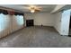Large living room with fireplace and neutral carpet at 4912 Atlanta St, Anderson, IN 46013