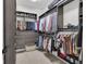 Spacious walk-in closet with custom shelving and ample storage for organization at 501 Fletcher Ave # A, Indianapolis, IN 46203