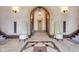 Elegant foyer with tile flooring, high ceilings, and ornate stairway at 501 Fletcher Ave # A, Indianapolis, IN 46203