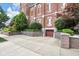 Brick facade with a garage surrounded by lush landscaping at 501 Fletcher Ave # A, Indianapolis, IN 46203