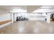 Open three-car garage with room for storage and workbench at 501 Fletcher Ave # A, Indianapolis, IN 46203