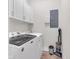 Bright laundry room with modern washer and dryer, featuring ample storage at 501 Fletcher Ave # A, Indianapolis, IN 46203