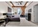 Bright main bedroom with exposed brick, wood beam ceiling, and modern furnishings at 501 Fletcher Ave # A, Indianapolis, IN 46203