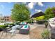 Outdoor brick patio offers a variety of seating options and a serene view at 501 Fletcher Ave # A, Indianapolis, IN 46203