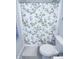 The bathroom includes a white toilet and shower with a bird and floral-themed shower curtain at 5081 Holborn Ave, McCordsville, IN 46055