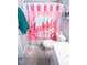 The bathroom features a toilet and a pink bubble gum-themed shower curtain at 5081 Holborn Ave, McCordsville, IN 46055