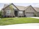 Attractive single-story brick home with a well-maintained lawn and fresh landscaping at 5081 Holborn Ave, McCordsville, IN 46055