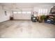Spacious two car garage with an automatic door provides ample parking and storage space at 5081 Holborn Ave, McCordsville, IN 46055