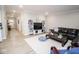 Spacious living room featuring modern decor, ample seating, and natural light at 5081 Holborn Ave, McCordsville, IN 46055