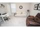 Well-lit living room with comfortable furniture, perfect for relaxing and entertaining guests at 5081 Holborn Ave, McCordsville, IN 46055