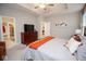 Bright main bedroom featuring tray ceiling, dresser, and walk-in closet entrance at 5081 Holborn Ave, McCordsville, IN 46055