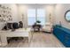 The office area includes a desk and chair, wood flooring, and large windows at 5081 Holborn Ave, McCordsville, IN 46055