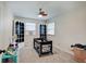 Neutral bedroom featuring built-in bookcases and gray carpet at 5226 W Southport Rd, Indianapolis, IN 46221