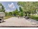 Concrete patio with outdoor furniture, grill, and green grass at 5226 W Southport Rd, Indianapolis, IN 46221