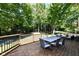 Outdoor deck area perfect for relaxing with dark wood and seating at 5826 Winding Way Ln, Indianapolis, IN 46220