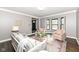 Comfortable living room with a large bay window at 5826 Winding Way Ln, Indianapolis, IN 46220