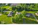 Aerial view showcasing well-manicured lawns and mature trees around this property at 5850 E 54Th Pl, Indianapolis, IN 46226