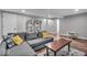 Basement area with cozy furniture, playful decor, and versatile space for relaxation and recreation at 5850 E 54Th Pl, Indianapolis, IN 46226