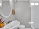 Bathroom showcasing modern sink, toilet, and shower design offering a refreshing experience at 5850 E 54Th Pl, Indianapolis, IN 46226