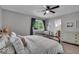 A soothing bedroom with a large window, soft lighting, and neutral color palette at 5850 E 54Th Pl, Indianapolis, IN 46226
