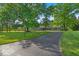Expansive lawn and mature trees surround this lovely ranch style home at 5850 E 54Th Pl, Indianapolis, IN 46226