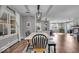 Bright dining area and open-concept living room with a fireplace at 5850 E 54Th Pl, Indianapolis, IN 46226