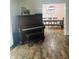 Open-concept dining room with a large wooden table perfect for entertaining at 597 W Adams St, Franklin, IN 46131