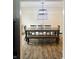 Elegant dining room featuring a large wooden table and stylish light fixture at 597 W Adams St, Franklin, IN 46131
