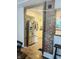 Updated kitchen featuring stainless steel refrigerator and brick work at 597 W Adams St, Franklin, IN 46131