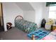Bright bedroom featuring a playful theme with a large window for ample natural light at 6052 N Deckshire Ln, Shirley, IN 47384