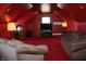 Finished attic space features comfortable couches and entertainment center at 6052 N Deckshire Ln, Shirley, IN 47384