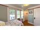 Cozy bedroom with a window seat and adjacent closet space at 622 N Dequincy St, Indianapolis, IN 46201
