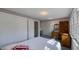 Well-lit bedroom with closet access and windows, providing a comfortable living space at 622 N Dequincy St, Indianapolis, IN 46201