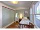 Comfortable bedroom featuring a charming mirror and lots of light at 622 N Dequincy St, Indianapolis, IN 46201