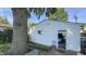 Exterior view of detached single-car garage with open door and white siding at 622 N Dequincy St, Indianapolis, IN 46201