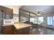Bright kitchen open to living area features wood floors, breakfast bar, and open floor plan at 622 N Dequincy St, Indianapolis, IN 46201