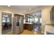 Modern kitchen with stainless steel refrigerator and view of dining area at 622 N Dequincy St, Indianapolis, IN 46201